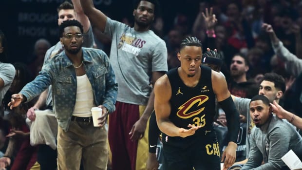 Mar 5, 2024; Cleveland, Ohio, USA; Cleveland Cavaliers forward Isaac Okoro (35) celebrates after hitting a three-point basket during the first half against the Boston Celtics at Rocket Mortgage FieldHouse. Mandatory Credit: Ken Blaze-USA TODAY Sports